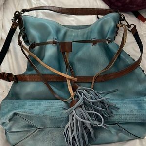 Moda Luxe bag. Beautiful color and fun! Never used